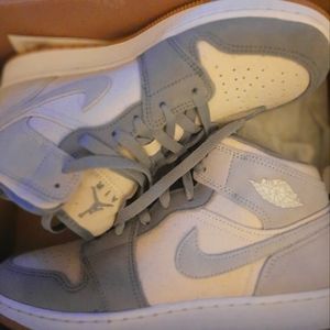 Air Jordan 1 mid, youth size 7 color grey/coconut milk. Brand new never worn.